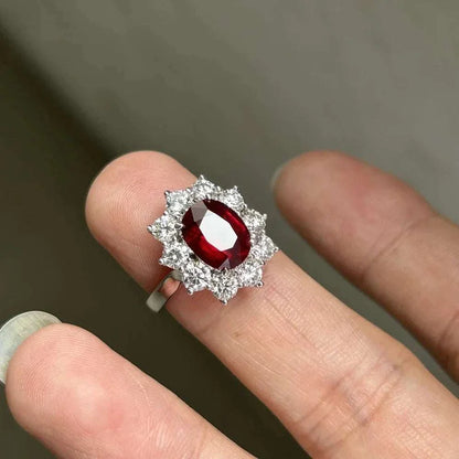 3 carat Mozambique ruby ring with white gold and diamond halo setting