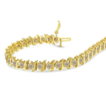 10K yellow gold coated sterling silver bracelet with prong set round brilliant cut diamonds in S-shaped links