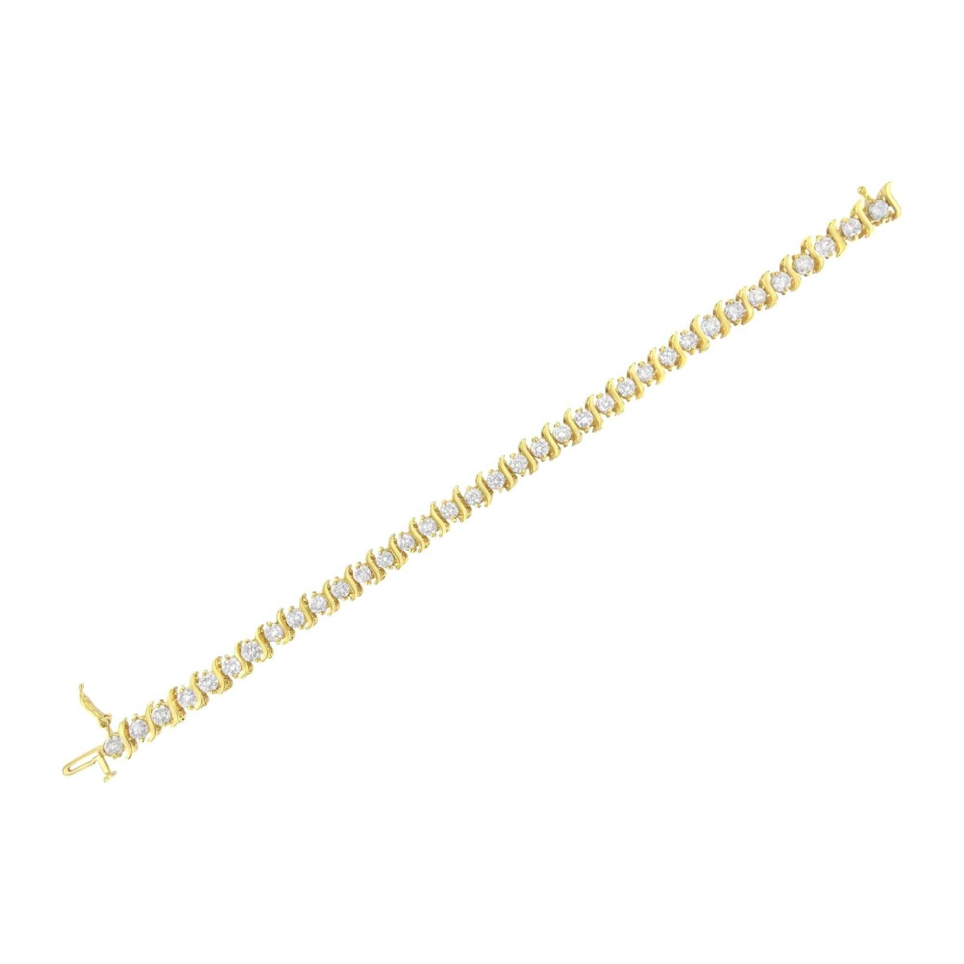 Prong set round brilliant cut diamond S-link bracelet in 10K yellow gold coated sterling silver.