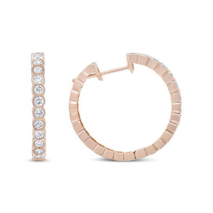 18K rose gold hoop earrings with 1 cttw round bezel-set diamonds and latch back closure