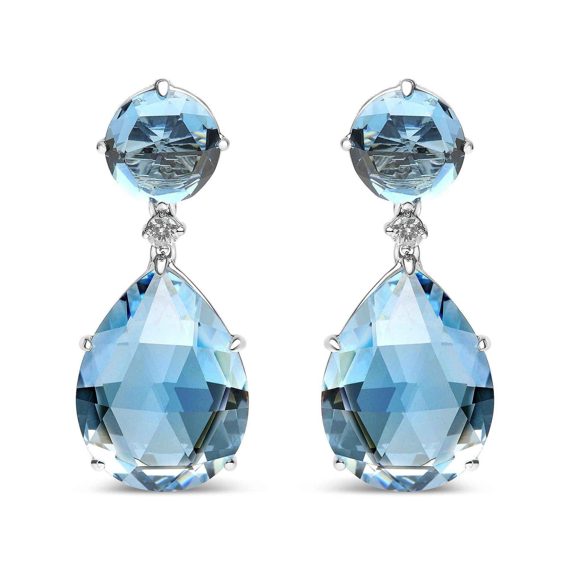 18K white gold earrings with round London Blue Topaz, 1/5 cttw diamonds, and pear-cut Sky Blue Topaz gemstones