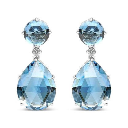 18K white gold earrings with round London Blue Topaz, 1/5 cttw diamonds, and pear-cut Sky Blue Topaz gemstones