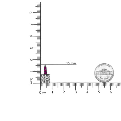 Round diamond and graduated red ruby drop earring next to rulers for size measurement, showing 16mm length.