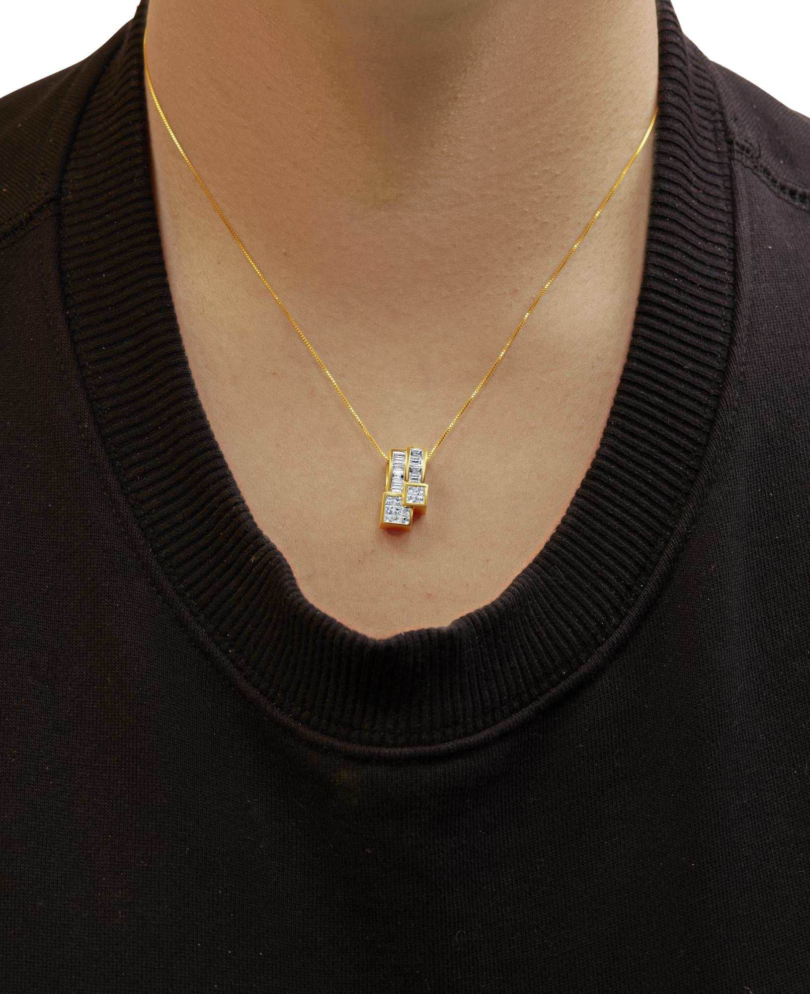 14K yellow gold geometric pendant necklace with baguette and princess-cut diamonds on an 18-inch box chain worn on neck