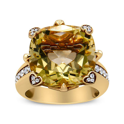 18K yellow gold cocktail ring with lemon quartz cushion cut center stone and diamond accents on prongs and band