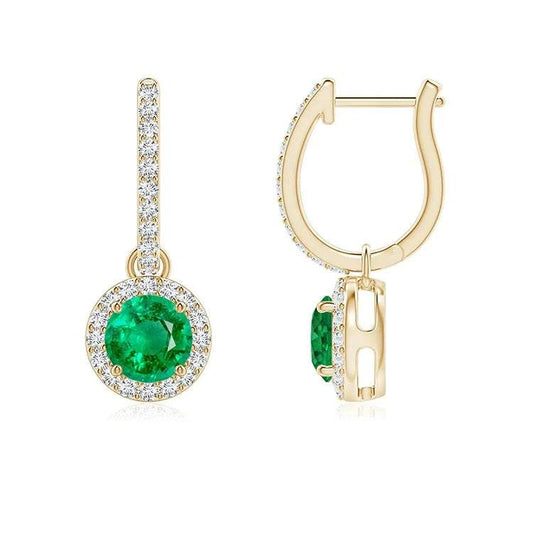 Gold drop earrings with vibrant round emerald center stones surrounded by a halo of sparkling cubic zirconia gemstones