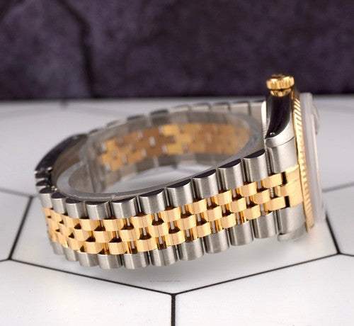 Close-up of Date-just of the Azure Aegis watch showcasing gold and steel Jubilee bracelet with polished and brushed links.