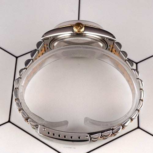 Side view of the Date-just of the Azure Aegis watch featuring a gold crown and two-tone Jubilee bracelet in steel and gold