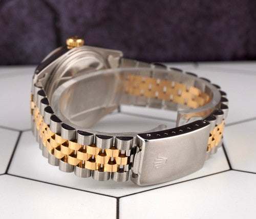 Two-tone gold and steel Jubilee bracelet of the Date-just of the Azure Aegis watch with secured clasp.