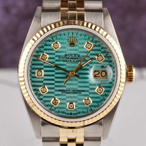 Close-up of the Date-just of the Azure Aegis Rolex watch featuring a blue patterned dial with diamond hour markers, gold bezel, and two-tone gold and steel Jubilee bracelet.