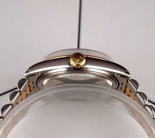 Side view of the Date-just of the Azure Aegis watch showcasing its gold crown and two-tone Jubilee bracelet in steel and yellow gold.
