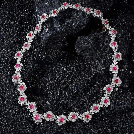 Fine jewelry necklace with solid 18K white gold, natural spinel gemstones, and diamonds totaling 14.55ct