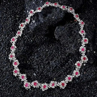 Fine jewelry necklace with solid 18K white gold, natural spinel gemstones, and diamonds totaling 14.55ct