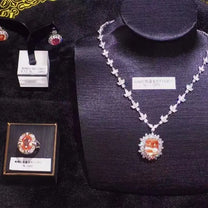 Royal Sapphire “Eternal Dawn” – 18K Gold Sri‑Lankan Pad Padparadscha Wedding Set (Un‑heated, Natural) - The Sparkling Squirrels 