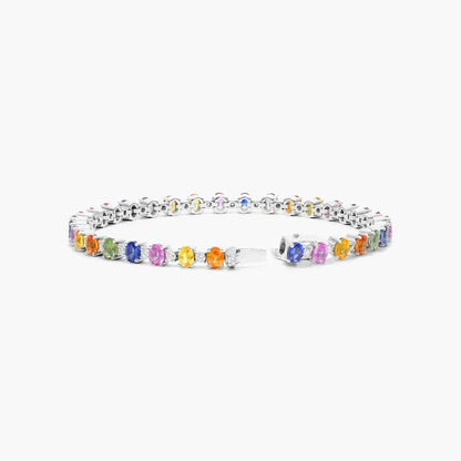 Silver tennis bracelet with multicolored gemstones inspired by the Bracelet of the Emerald Guardians