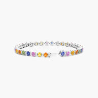 Silver tennis bracelet with multicolored gemstones inspired by the Bracelet of the Emerald Guardians