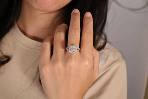 Lothlórien's Moonlit Whisper diamond band with 5.0ct cushion-cut center and 14k white gold halo setting on finger