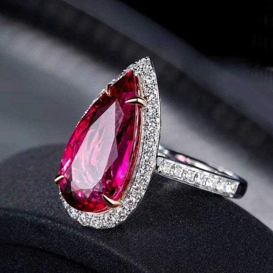 Pear shape rubilite gemstone ring with 18k gold band and diamond accents, elegant wedding jewelry for women