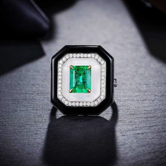 18k gold ring with natural emerald center stone and diamond accents in a new fashion design for men and women