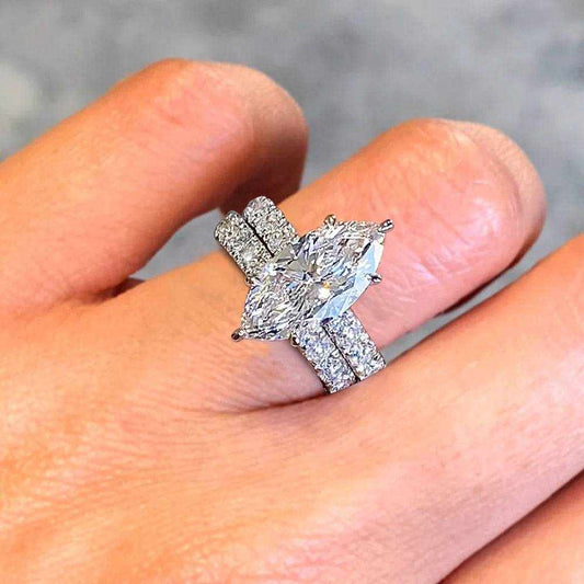 4.26ctw marquise cut diamond engagement ring bridal set in 14k white gold on finger