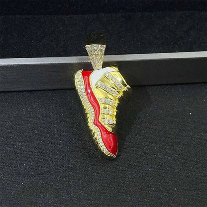Gold and red sneaker-shaped pendant encrusted with sparkling diamonds, personalized fashion shoe charm accessory