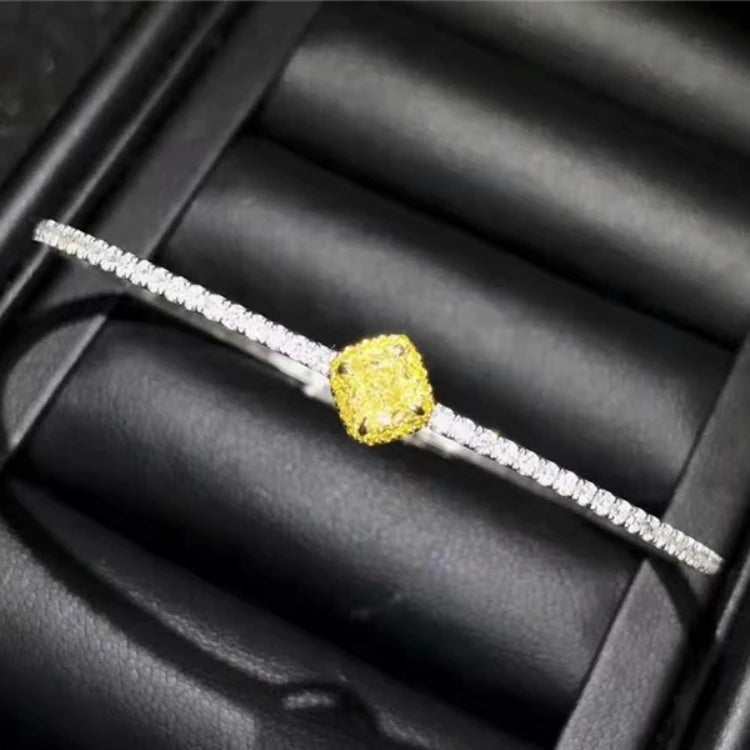 18K gold luxury bangle with 0.364ct natural yellow diamond and diamond accents in elegant design