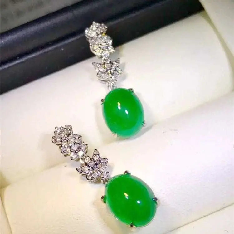 18k gold South Africa earrings with natural green emerald drop and diamond accents
