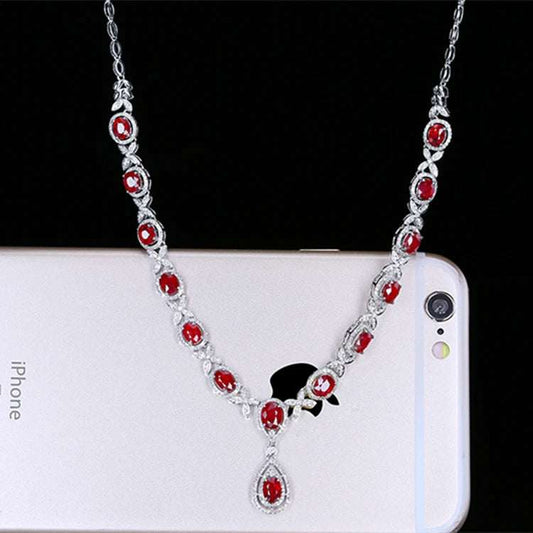 SGARIT Joyas De Boda 18k gold necklace with 7.5ct unheated genuine red ruby gemstones, luxury custom bridal jewelry.