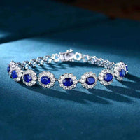 SGARIT Wholesale Jewelry 18K white gold bracelet featuring 3.85CT natural Sri Lanka blue sapphires surrounded by diamonds