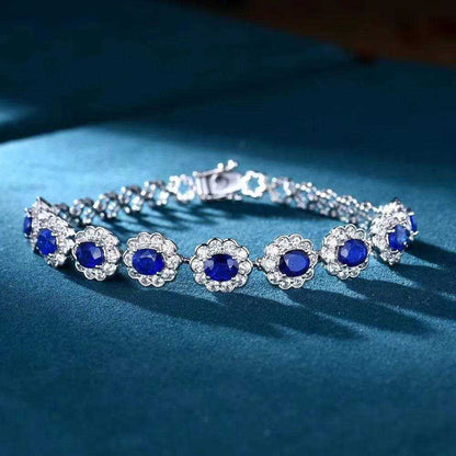 SGARIT Wholesale Jewelry 18K white gold bracelet featuring 3.85CT natural Sri Lanka blue sapphires surrounded by diamonds
