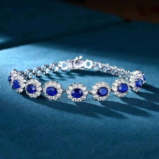 SGARIT Wholesale Jewelry 18K white gold bracelet featuring 3.85CT natural Sri Lanka blue sapphires surrounded by diamonds
