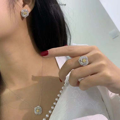 Elegant Valentine Love Serial Rose Jewelry Set with 18K gold, natural diamonds, rose motifs on ring, earrings, and necklace worn by model