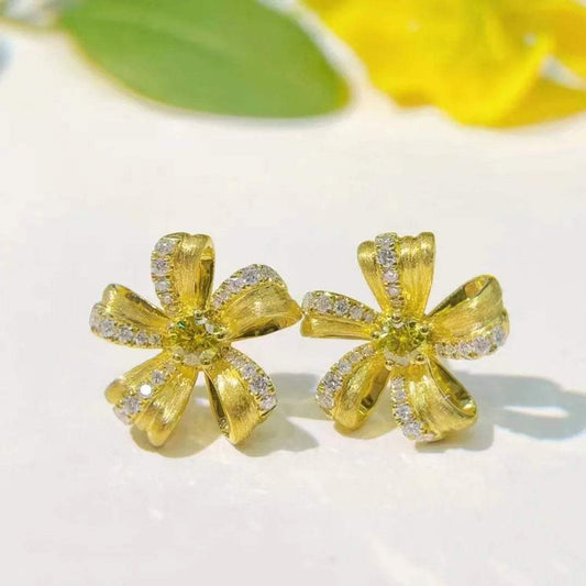 Natural yellow diamond floral stud earrings in 18K gold with 0.39ct diamonds