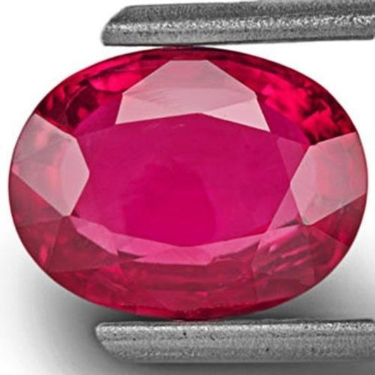 2.27 ct oval untreated Mozambique neon ruby named Ember of Nyx with vivid pink-red color and GIA certification