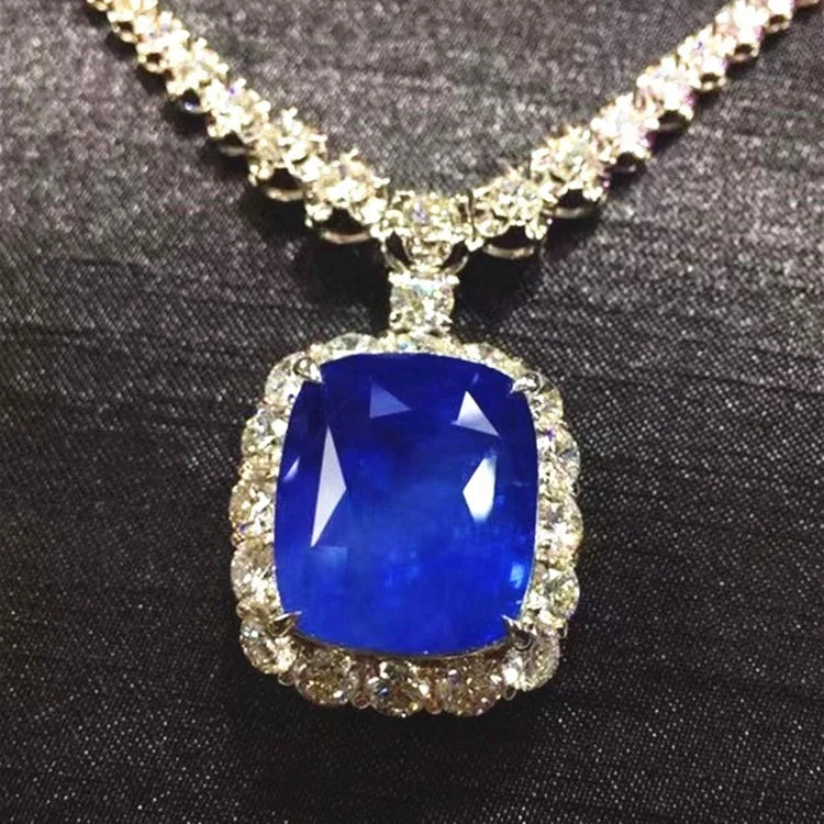 SGARIT Rare Collection pendant featuring 41.33ct Burma cornflower blue sapphire in 18k white gold with diamond halo